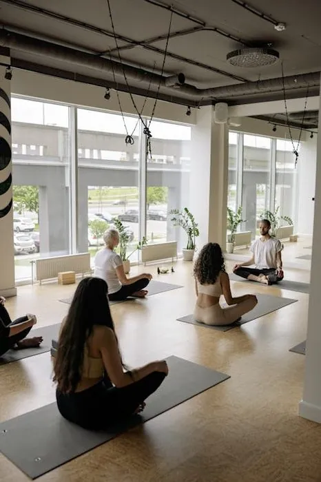 Group meditation class with morning light